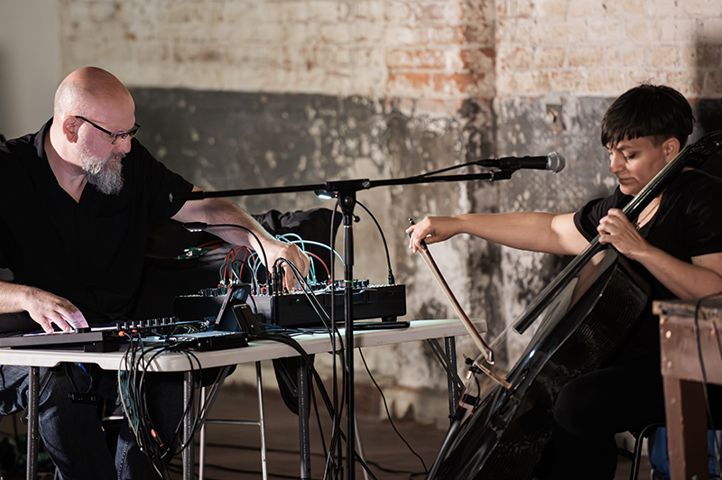 /images/about/photographs/mem1-live_at_project_blank.jpg
